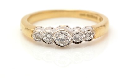 Lot 416 - A five stone diamond ring