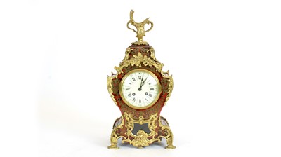 Lot 1200 - A Louis XV style boulle and gilt bronze mantel clock.