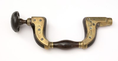 Lot 516 - Thomas Turner & Co, Suffolk Works, Sheffield: a brass and ebony 'Warranted Superior' brace drill