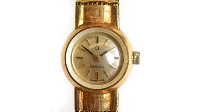 Lot 519 - Omega: a lady's 9ct yellow gold cocktail watch