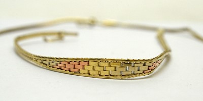 Lot 160 - A 14ct three-coloured gold necklace and bracelet