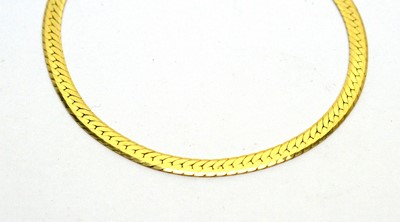 Lot 160 - A 14ct yellow gold necklace and bracelet
