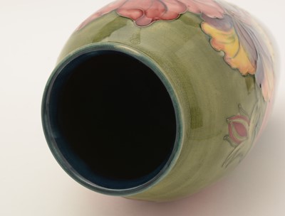 Lot 411 - Moorcroft Hibiscus pattern vase.