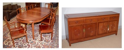 Lot 64 - A modern Chinese hardwood ten-piece dining room suite.