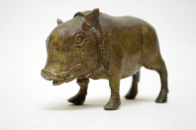 Lot 399 - A Chinese bronze figure of a pig.
