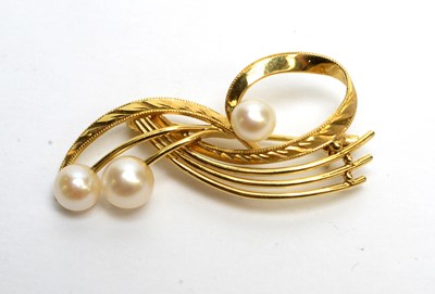 Lot 120 - A pearl brooch and a garnet brooch.