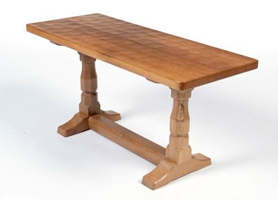 Lot 1274 - Workshop of Robert ‘Mouseman’ Thompson (Kilburn): an oak refectory coffee table.