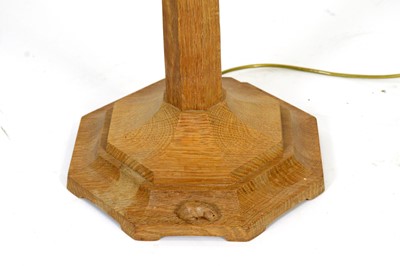 Lot 1259 - Workshop of  Robert ‘Mouseman’ Thompson (Kilburn): an oak standard lamp