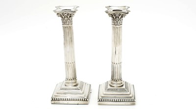 Lot 574 - A pair of Edward VII silver candlesticks, by Hawksworth, Eyre & Co Ltd