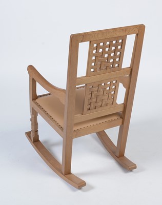 Lot 1279 - Workshop of Robert 'Mouseman' Thompson (Kilburn): oak rocking chair.