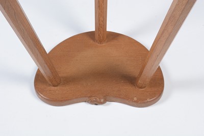 Lot 1283 - Workshop of Robert ‘Mouseman’ Thompson (Kilburn): an oak cow stool.