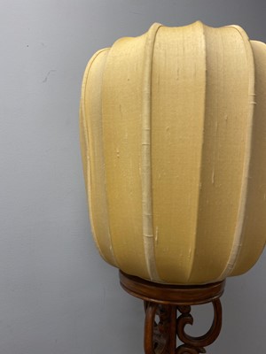 Lot 49 - A pair of Chinese hardwood adjustable standard lamps