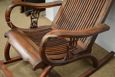 Lot 44 - A Chinese hardwood rocking chair