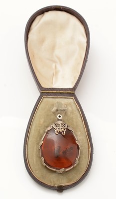 Lot 187 - An amber specimen pendant