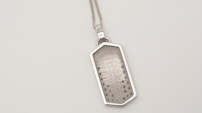 Lot 434 - An 18ct white gold and diamond pendant