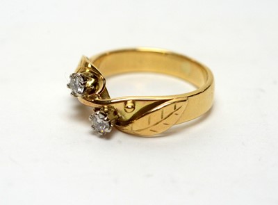 Lot 435 - A two stone diamond ring