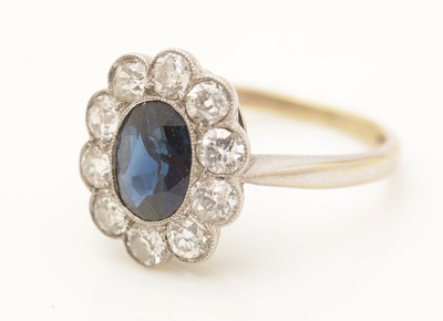 Lot 441 - A sapphire and diamond cluster ring