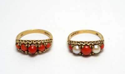 Lot 165 - Two coral set rings.