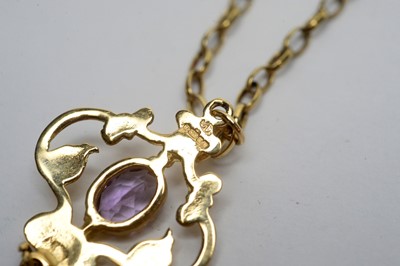 Lot 169 - A 9ct yellow gold and amethyst set Edwardian style pendant