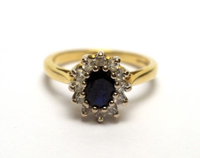 Lot 178 - A sapphire and diamond cluster ring