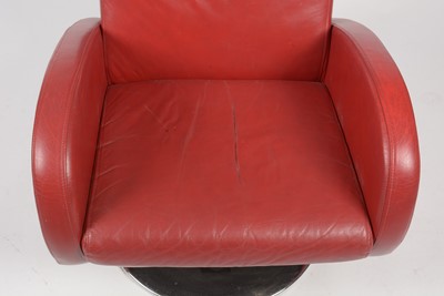 Lot 328 - A contemporary red leather swivel reclining armchair