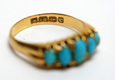 Lot 107 - A turquoise ring; a sapphire and pearl ring; and two others.