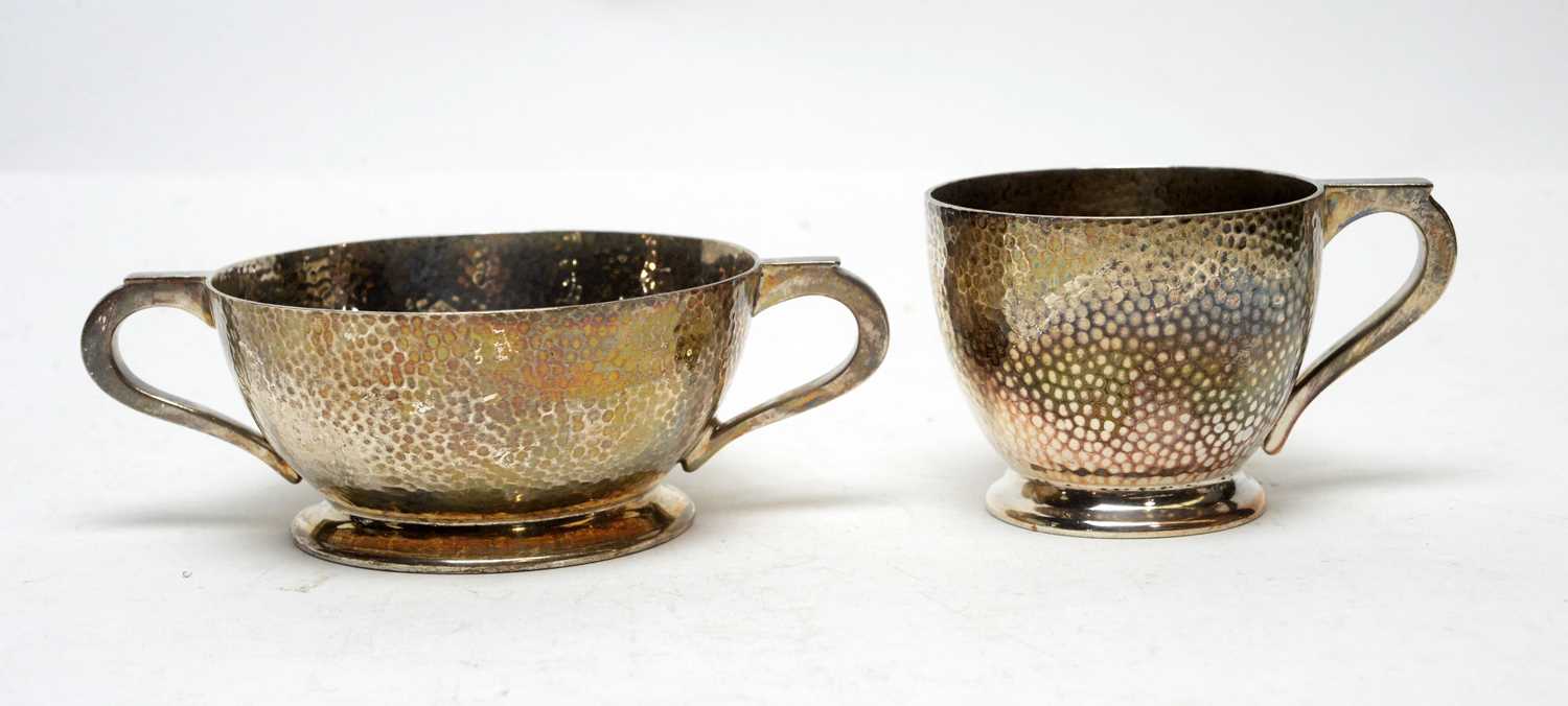 Lot 180 - A silver teacup and two handled sugar bowl, by Deakin & Francis