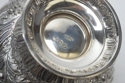 Lot 181 - A Victorian three piece silver tea service, by Edward Barnard & Sons Ltd