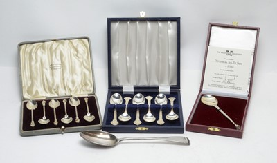 Lot 190 - A Victorian silver tablespoon; a Millenium spoon and two cased sets.