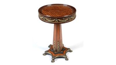 Lot 1337 - An ornate Empire style parquetry and gilt metal mounted side/occasional table.