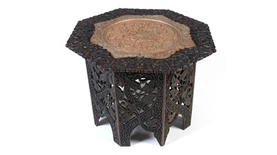 Lot 1338 - An ornate Anglo-Indian chip-carved hardwood table.