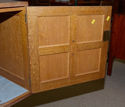 Lot 339 - A 1930s oak sideboard by Boosbeck Industries.
