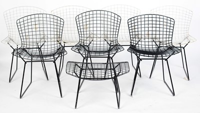 Lot 342 - Harry Bertoia; seven mid-century wire chairs; matching stool; and later fabric covers.
