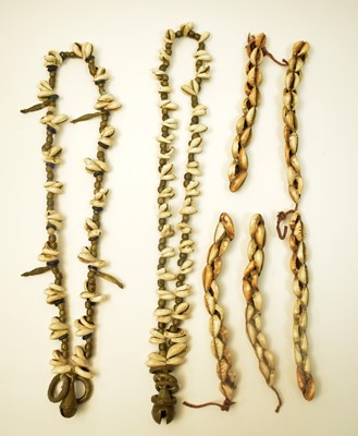 Lot 477 - Two Kapsiki necklaces, and cowry shell bracelets