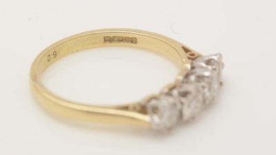 Lot 468 - A four stone diamond ring