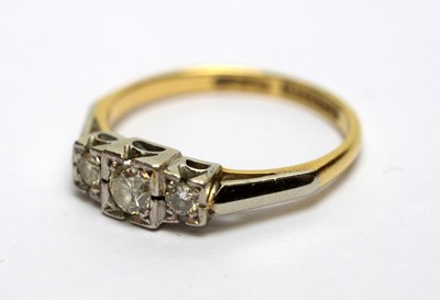 Lot 164 - A three stone diamond ring