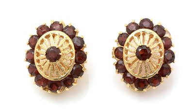 Lot 455 - A pair of garnet and 18ct yellow gold clip earrings