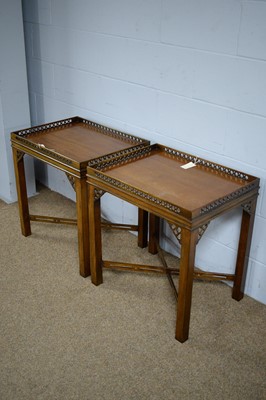 Lot 10 - A pair of substantial mahogany occasional tables.