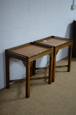 Lot 10 - A pair of substantial mahogany occasional tables.
