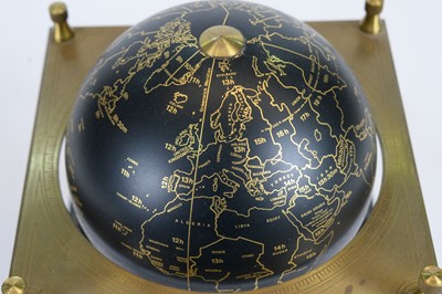 Sold at Auction: Royal geographical Society world globe on wooden