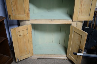 Lot 51 - A 19th Century stripped pine floor standing corner cupboard.