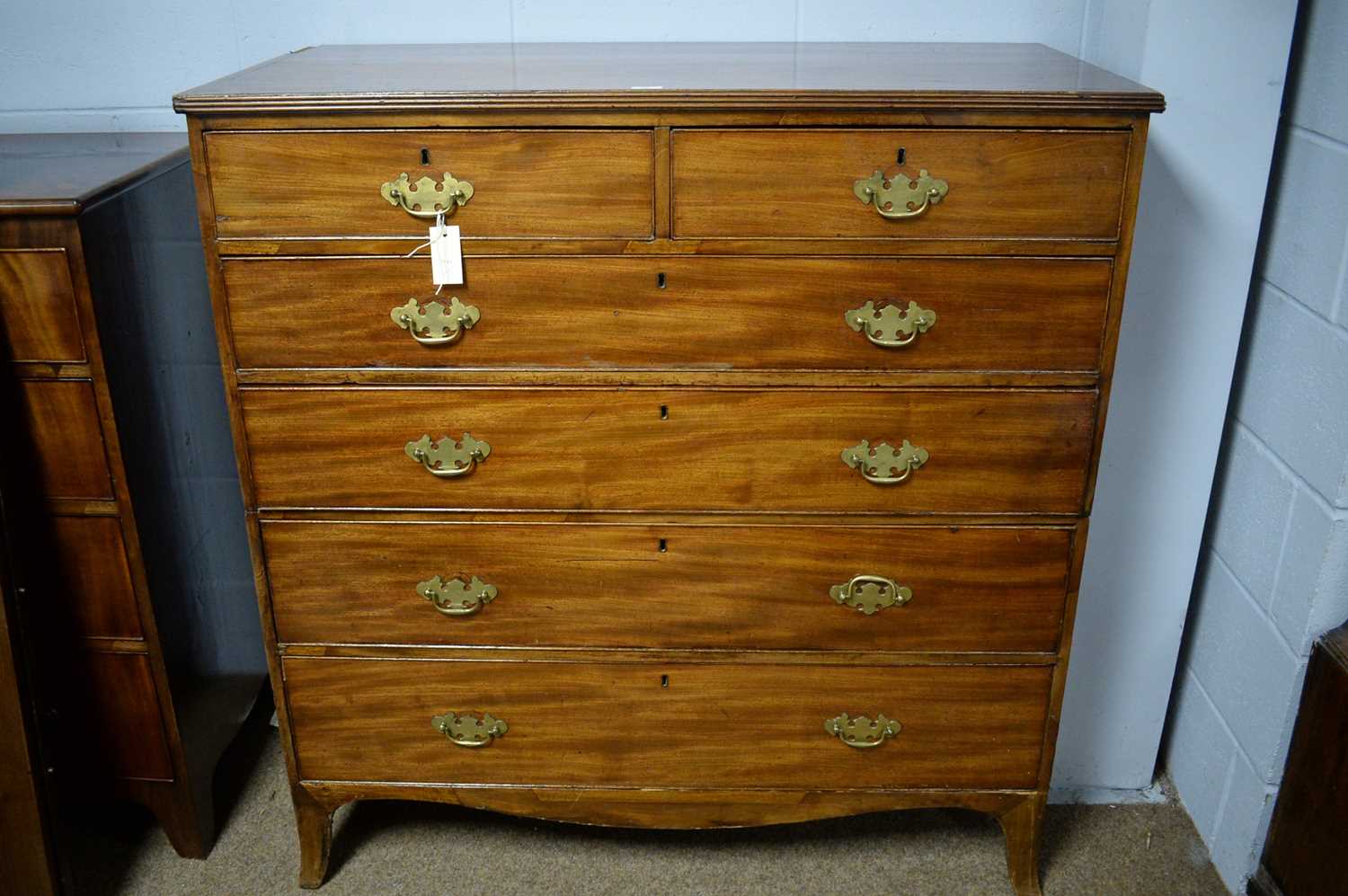 Lot 55 - A George III mahogany chest.