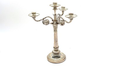 Lot 570 - A George III silver three-branch candelabrum, by Benjamin Smith II