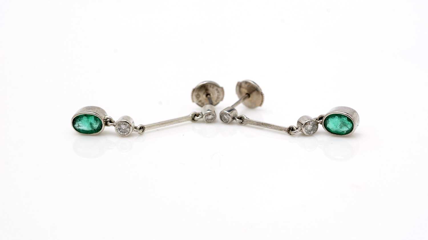 Lot 458 - A pair of emerald and diamond earrings