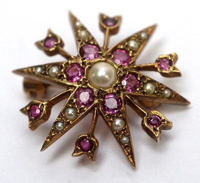 Lot 155 - A pink sapphire and seed pearl brooch
