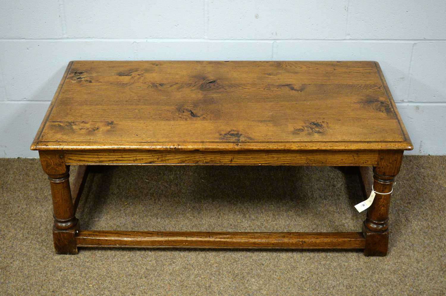 Lot 36 - A substantial oak rectangular coffee table.