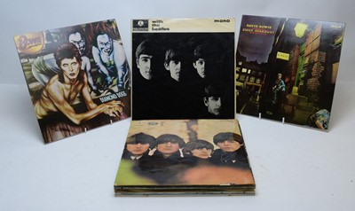 Lot 207 - 12 LPs by The Beatles and David Bowie.