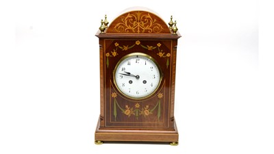 Lot 1201 - Marti Et Cie: an early 20th Century inlaid mahogany mantel clock.