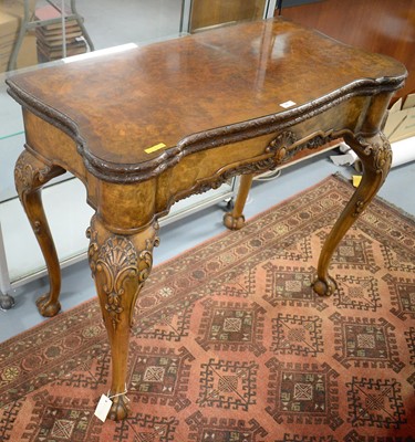 Lot 77 - A Georgian-style burr walnut serpentine fronted card table.