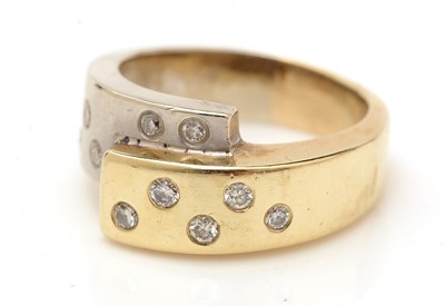 Lot 351 - A 14ct yellow and white gold and diamond dress ring